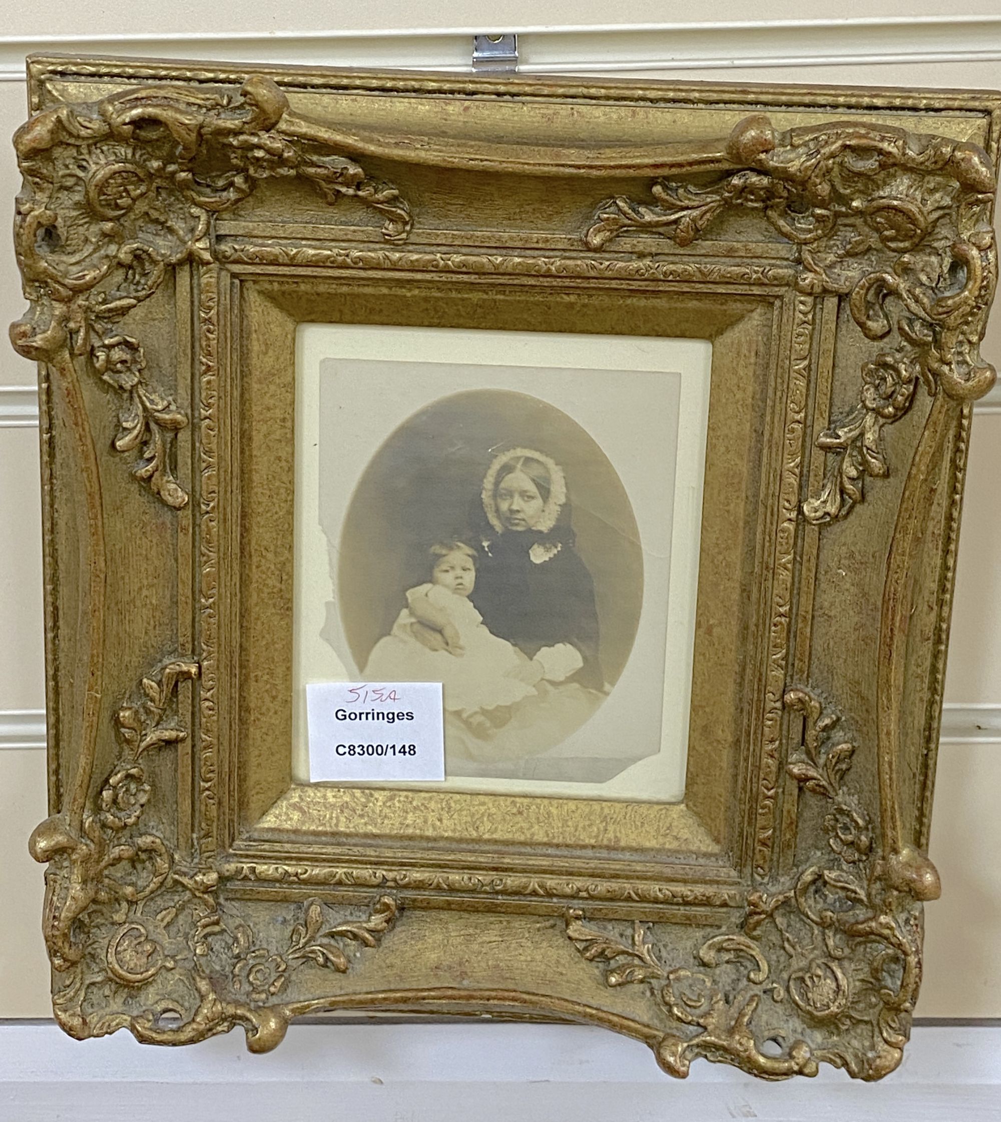 A Victorian framed photograph portrait of a mother and child